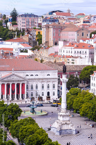 Rossio square with fountain located at Baixa district in Lisbon,