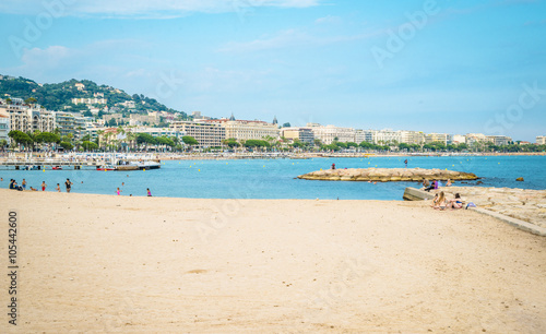 People on the most popular beach in Cannes  France - Plage de la Croisette - the famous beach on the Croisette  known for its film festival.