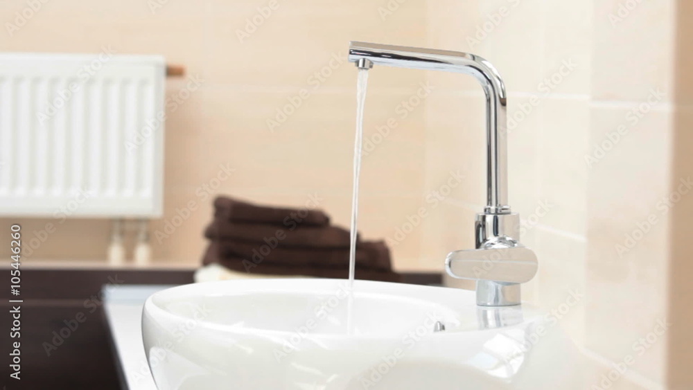 Sink in bathroom. Faucet at home Sink in bathroom. Faucet at home