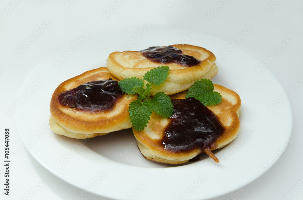 Pancakes with jam and mint
