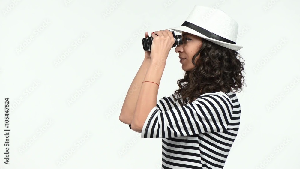 Closeup of woman looking through binoculars Closeup of woman looking through binoculars