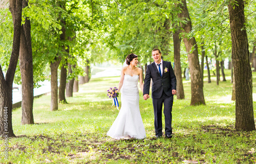 Bride and groom in the park