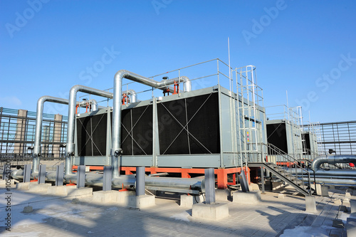 Sets of cooling towers in data center building.