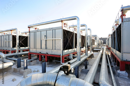 Sets of cooling towers in data center building.