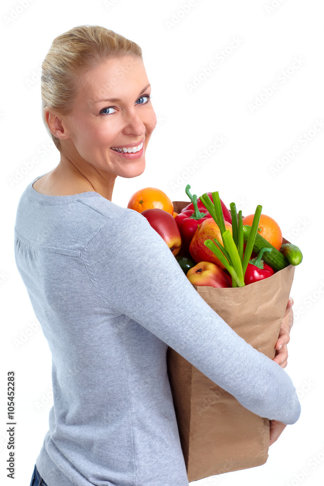 Beautiful woman holding shopping bag with food. Beautiful woman holding shopping bag with food.