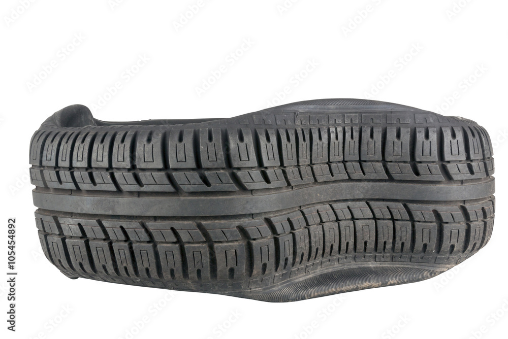 Closeup of Irregular Pattern in Tread on Tire after a Blowout Closeup of Irregular Pattern in Tread on Tire after a Blowout