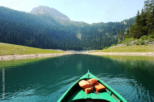 Boat on a mountain lake © nikodash
