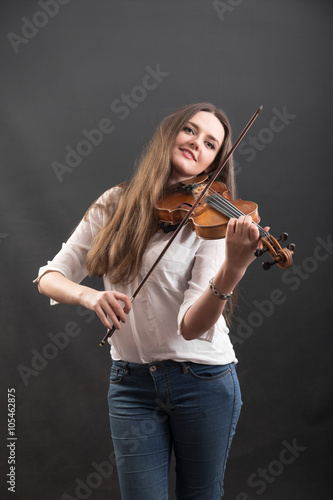 cheerful violinist with long hair