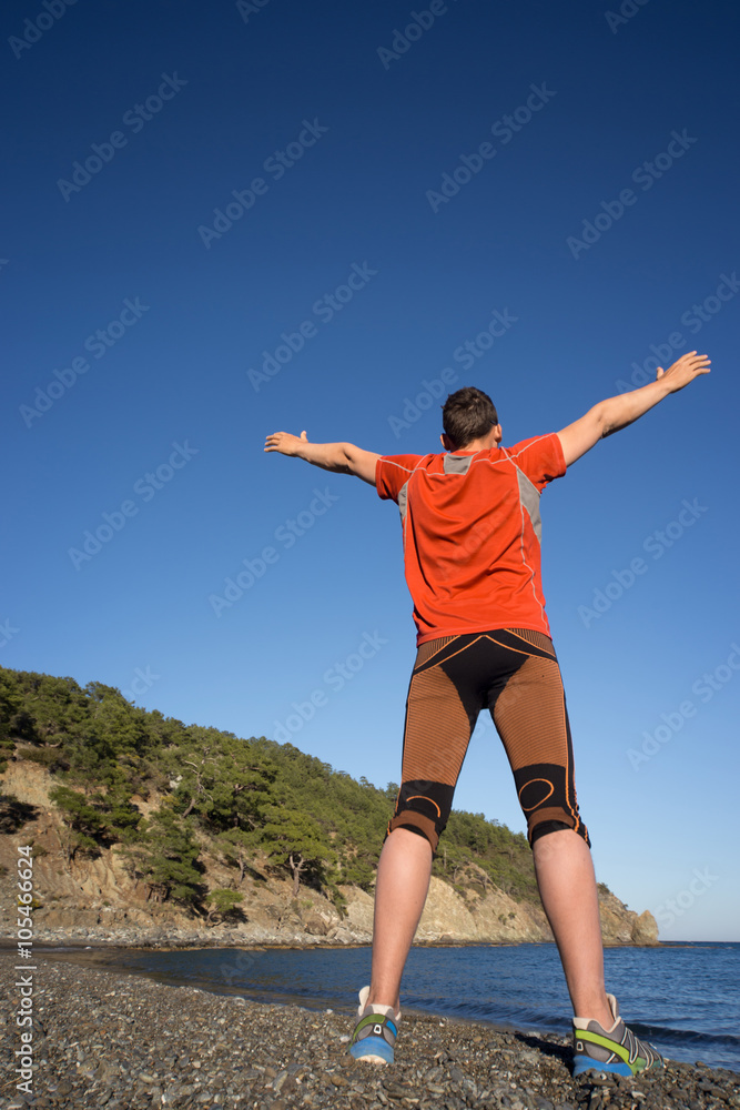 Fototapeta premium Running man in the summer in a beautiful location.