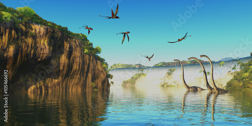Dimorphodon and Omeisaurus Dinosaurs - Omeisaurus herbivorous sauropod dinosaurs wade through a river below a waterfall as Dimorphodon flying reptiles fly overhead. © Catmando