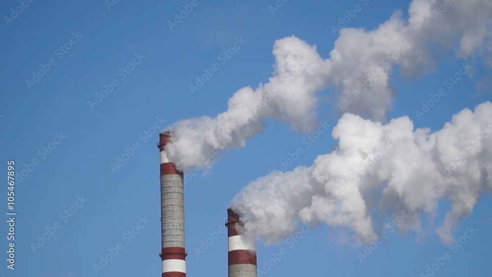 industrial chimneys emits toxic pollutants into the sky polluting the environment industrial chimneys emits toxic pollutants into the sky polluting the environment