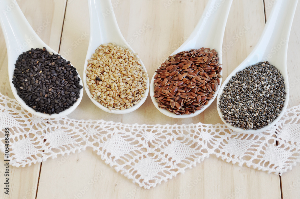 Useful seed. Proper nutrition with the addition of seeds. Chia seeds. Flax seeds. White sesame seeds. Sesame seeds black. Useful seed. Proper nutrition with the addition of seeds. Chia seeds. Flax seeds. White sesame seeds. Sesame seeds black.
