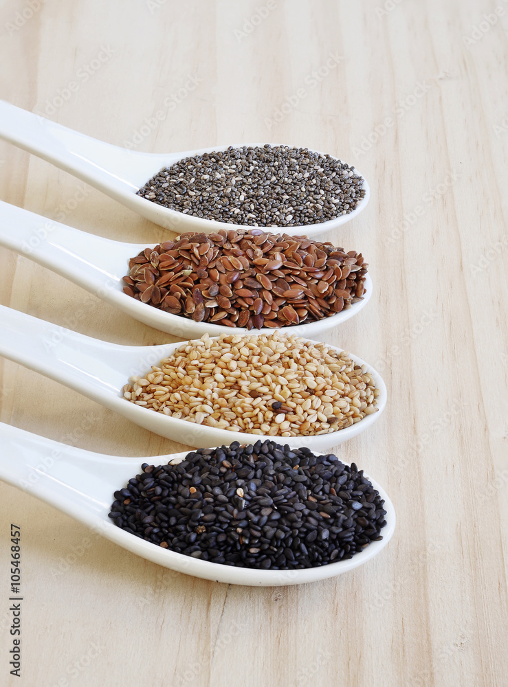 Useful seed. Proper nutrition with the addition of seeds. Chia seeds. Flax seeds. White sesame seeds. Sesame seeds black. Useful seed. Proper nutrition with the addition of seeds. Chia seeds. Flax seeds. White sesame seeds. Sesame seeds black.