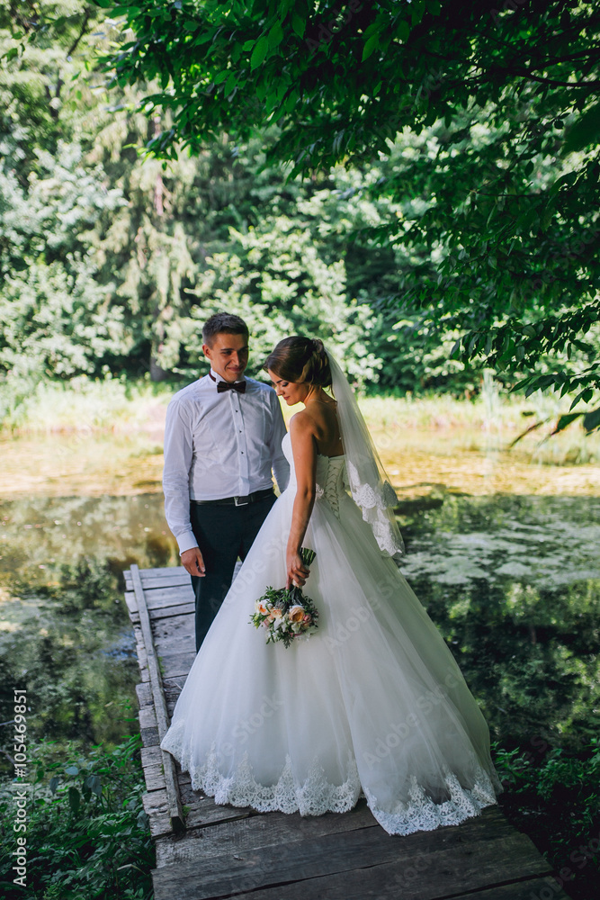 Fototapeta premium Married Couple in forest embracing