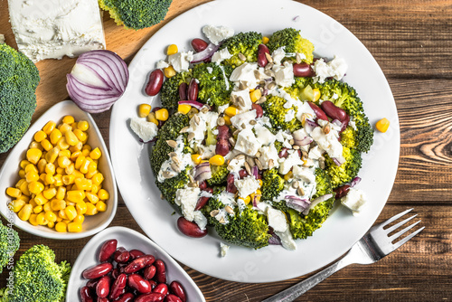 Broccoli salad with vegetables and feta cheese.