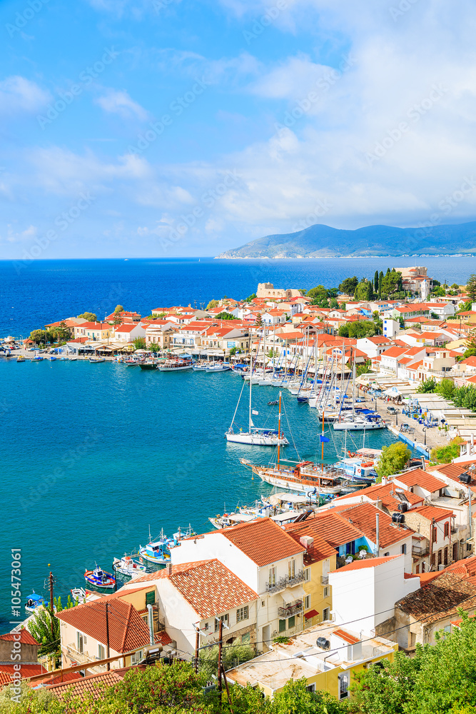 A view of Pythagorion port with colourful houses and blue sea, Samos island, Greece