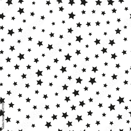 Repeating background from stars. Seamless pattern.