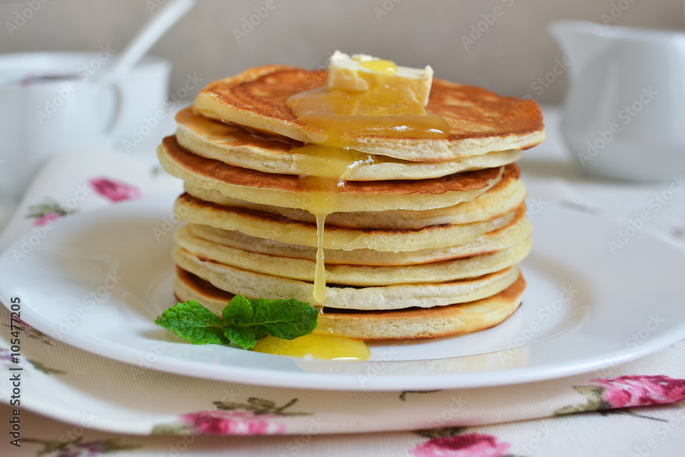 Pancakes for breakfast with butter and honey Pancakes for breakfast with butter and honey
