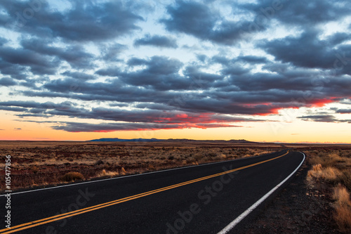 dramatic sunset sky and desert road