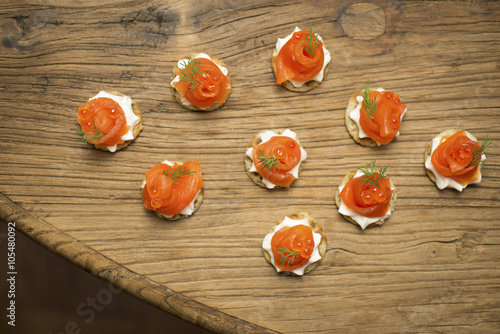Smoked Trout Blinis on a wooden table