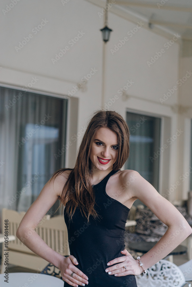 Very beautiful girl in a black dress