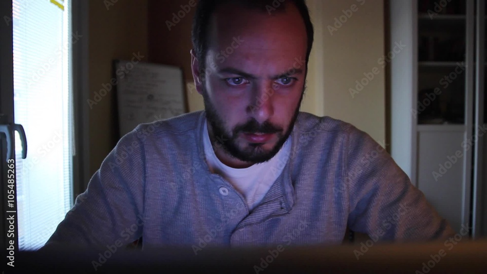 A man studies searching something on the web he is using computer A man studies searching something on the web he is using computer
