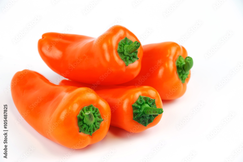 fresh colored peppers on the white background