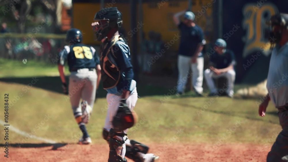 Batter hitting ball and running to first base during a baseball game. Batter hitting ball and running to first base during a baseball game.