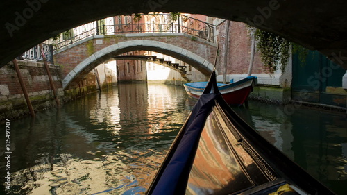 Gondola ride in Venice passing venetian architecture