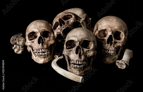 Still life human skull and bones, genocides concept