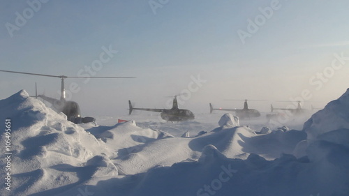 4 helicopters taking off one by one. Russian Ice Camp 