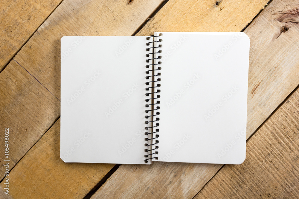 White blank paper notepad book at office worplace. Copy space White blank paper notepad book at office worplace. Copy space