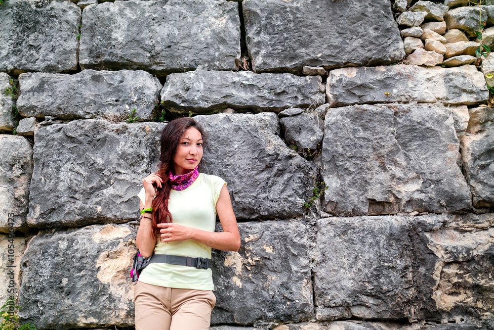 Female Tourist Exploring abandoned old fortress Female Tourist Exploring abandoned old fortress