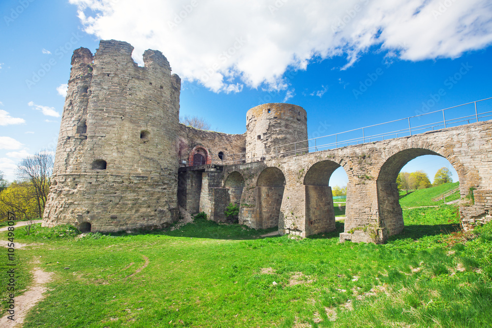 Medieval Russian Koporye fortress with two towers and bridge