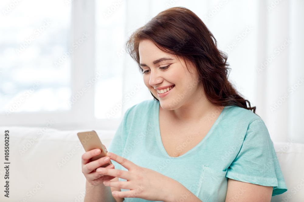 happy plus size woman with smartphone at home happy plus size woman with smartphone at home