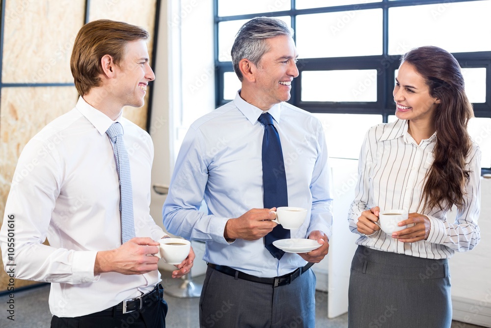 Fototapeta premium Businesspeople interacting in office during breaktime