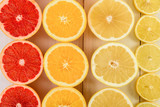 Orange, Grapefruit, Lemon And Lime Citrus Fruit Slices On Table