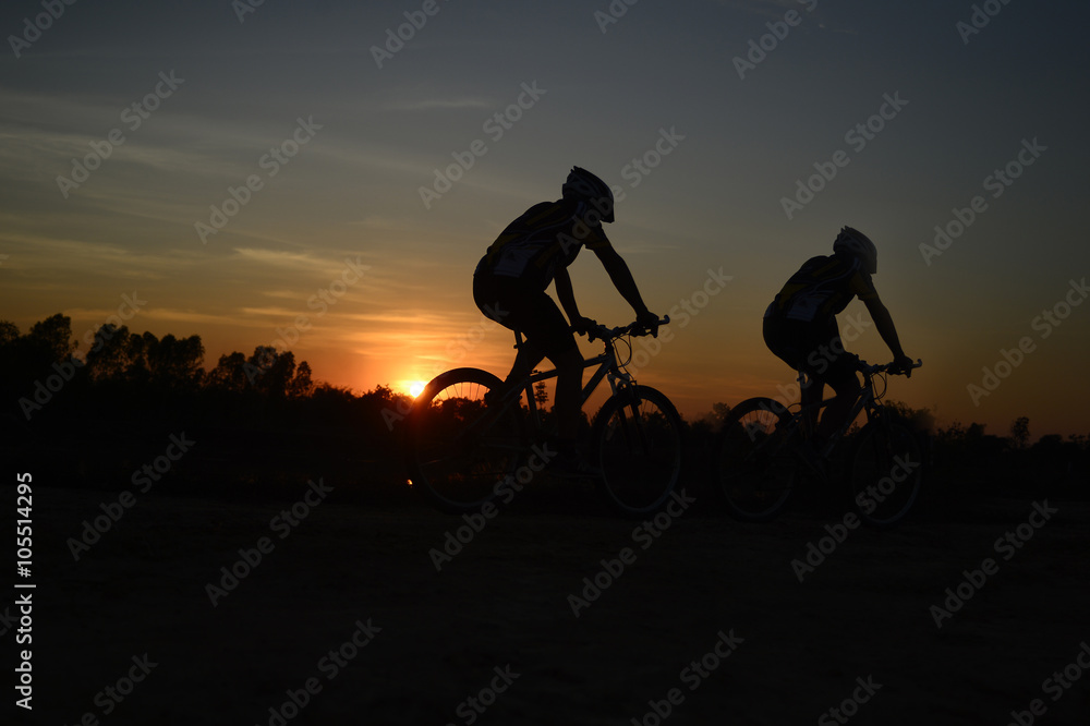 Obraz premium mountain bike ,twilight, people, action,
