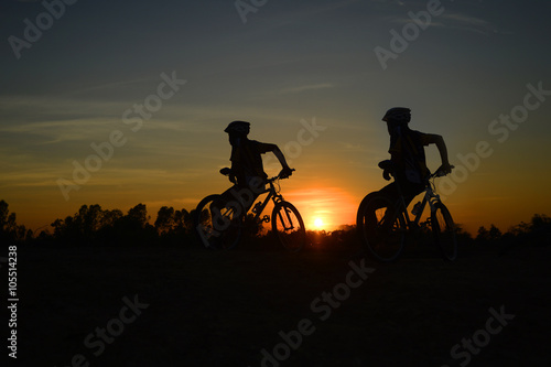 mountain bike ,twilight, people, action,