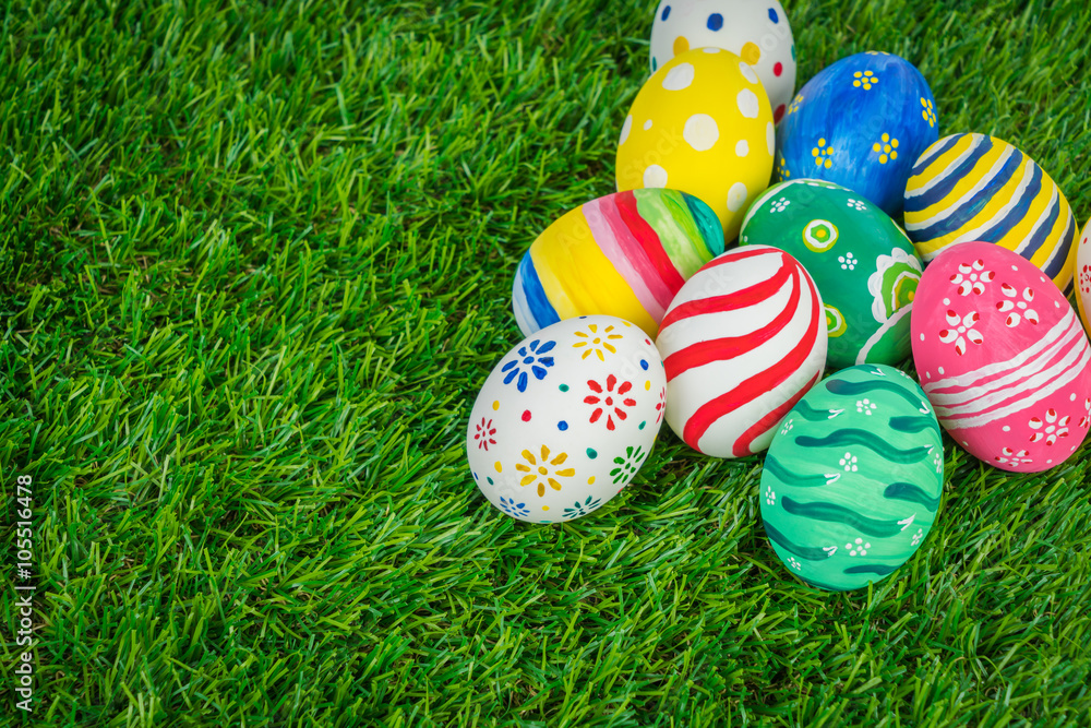 Fototapeta premium Easter Eggs on Fresh Green Grass