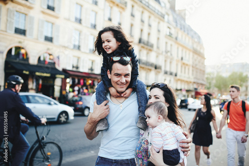 Big family walking the streets in Paris