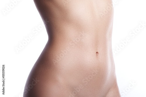 Beatiful body shapes. Slim waist, flat belly, soft clean skin. Perfect female body on white background. Sexy curves, sport form. Healthcare 