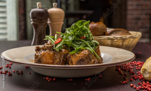 beef tails stew with wine and vegetables 