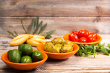 Tapas bowls with giant olives and cherry tomatoes