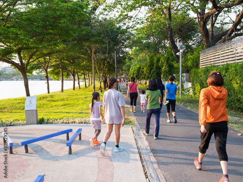 people ruuning at park in evening