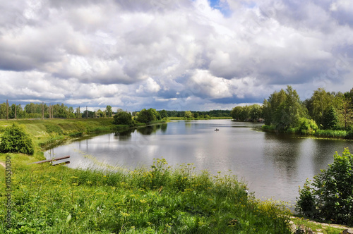 Landscape with lake reflection clouds Latvia, Jugla