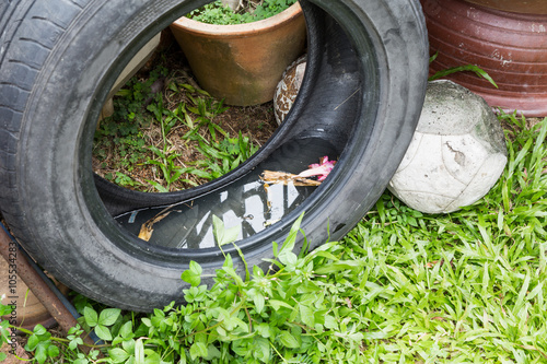 Used tires potentially store stagnant water and mosquitoes breeding ground photo