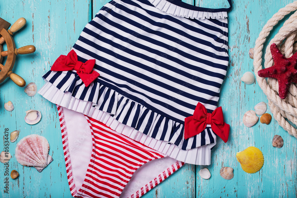 Fototapeta premium Children's swimsuit closeup, top view