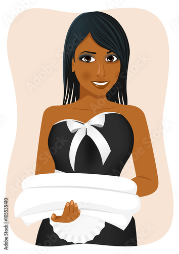 female african american housekeeping worker with towels and bedclothes