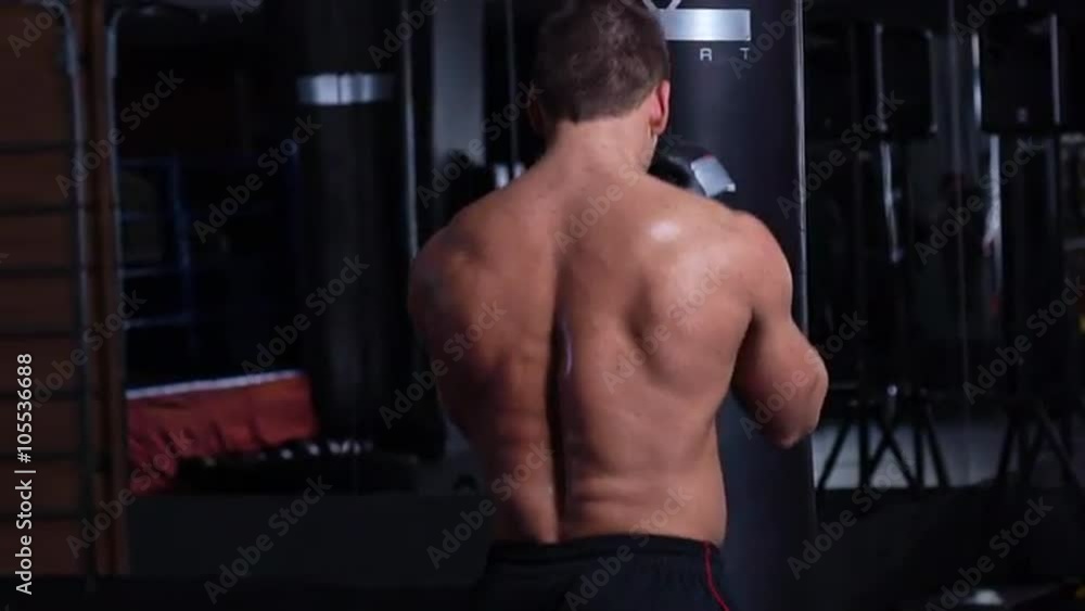 Handsome fit man boxing. Slow motion Handsome fit man boxing. Slow motion
